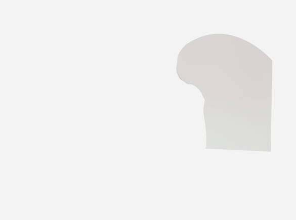 Mother wearing a Medela Freestyle™ Hands-free double electric wearable breast pump while using her phone