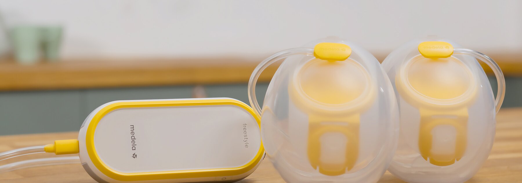 Freestyle™ Hands-free double electric wearable breast pump Medela Freestyle™ Hands-free double electric wearable breast pump sitting on counter
