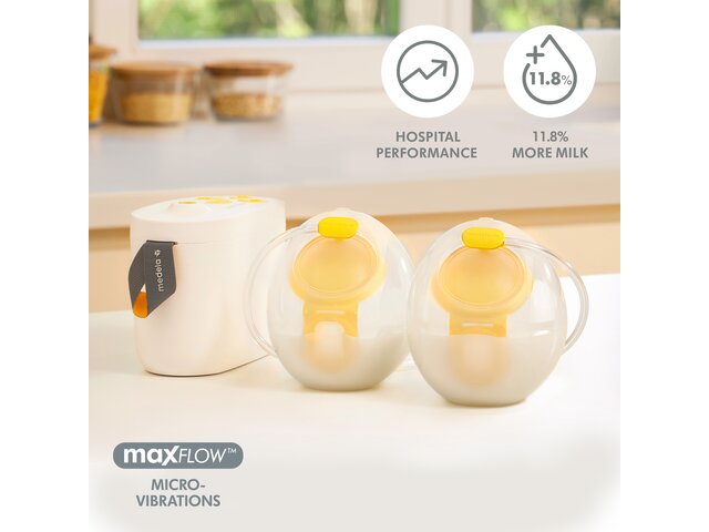Medela Pump In Style® Hands-free double electric breast pump with Hands-free collection cups filled with milk sitting on counter.  Text on image, "Hospital performance, 11.8% more milk, MaxFlow Micro-Vibrations"