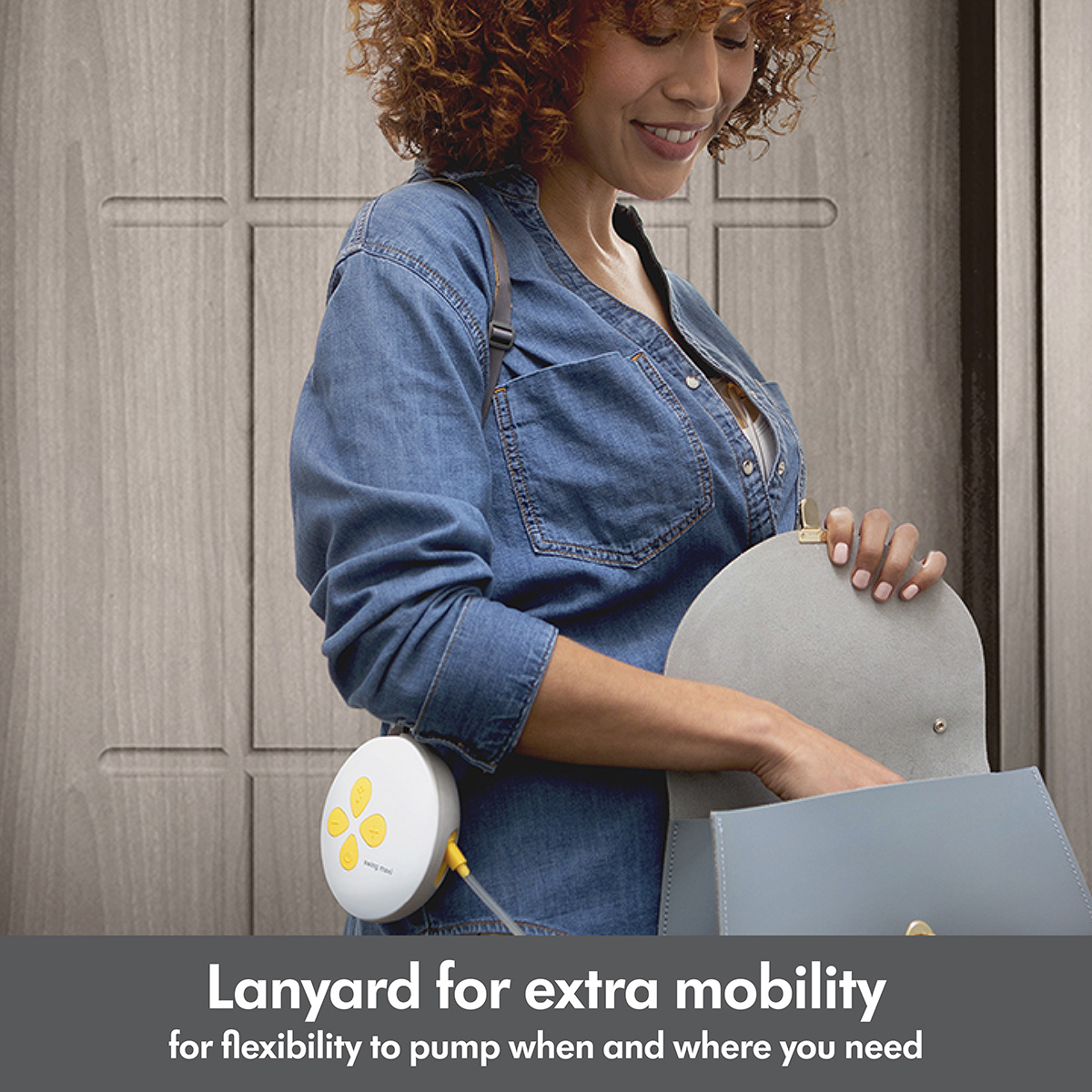 Woman walking out door wearing her Medela Swing Maxi™ double electric breast pump. Text below image reads, Lanyardd for extra mobility for flexibility to pump when and where you need"
