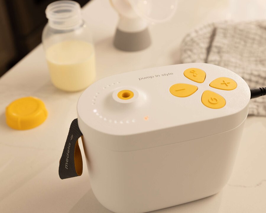 Pump In Style Pro breast pump Pump In Style Pro breast pump sitting on kitchen counter.