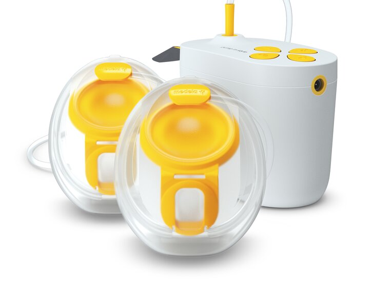Medela Pump In Style double electric breast pump shown with Hands-free collection cups