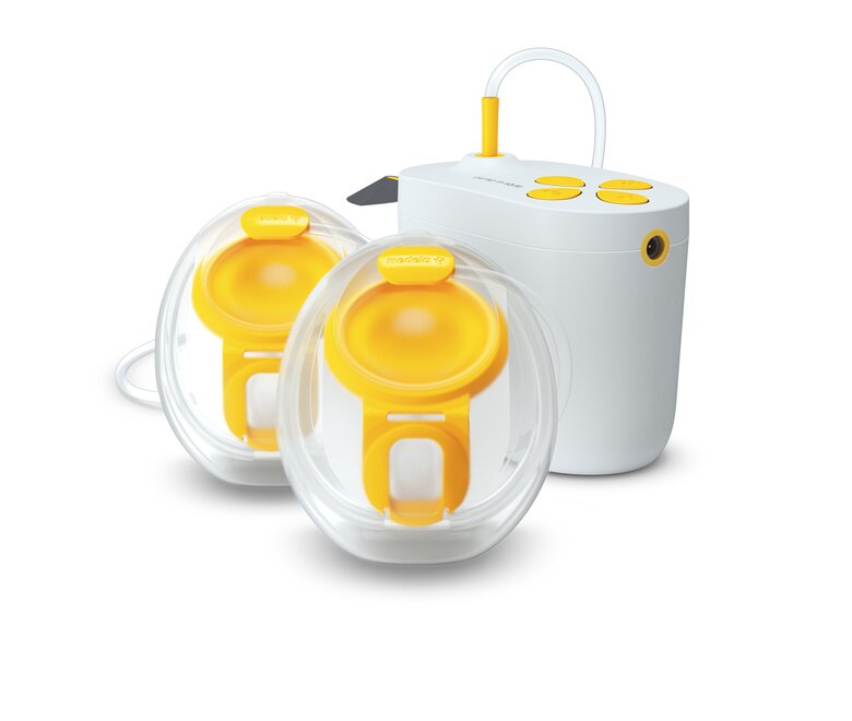 Medela Pump In Style double electric breast pump shown with Hands-free collection cups