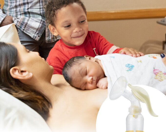 A family in a hospital room after the birth of a baby with the Pediatric Breast Pump Set with Harmony™ in the foreground.