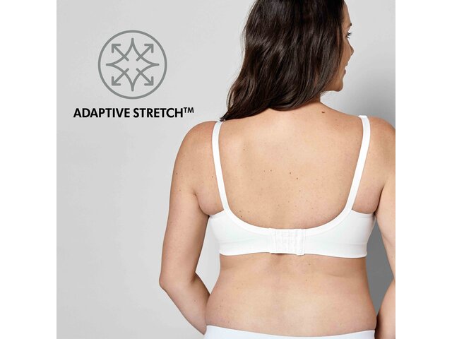 Femme portant un soutien-gorge blanc Medela Keep Cool™ Ultra Bra vue de dos avec le texte, « Adaptive Stretch ».