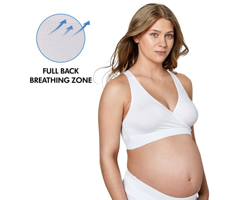 Donna che indossa un reggiseno Medela Keep Cool Sleep con il testo “Full Back Breathing Zone”.