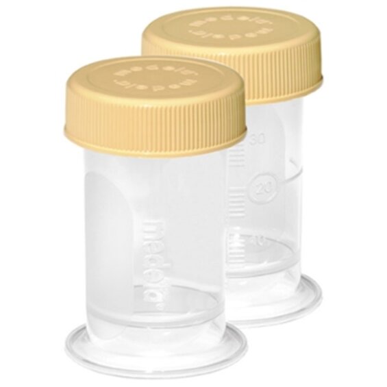 Two disposable 35 ml Medela Colostrum Containers with lids.