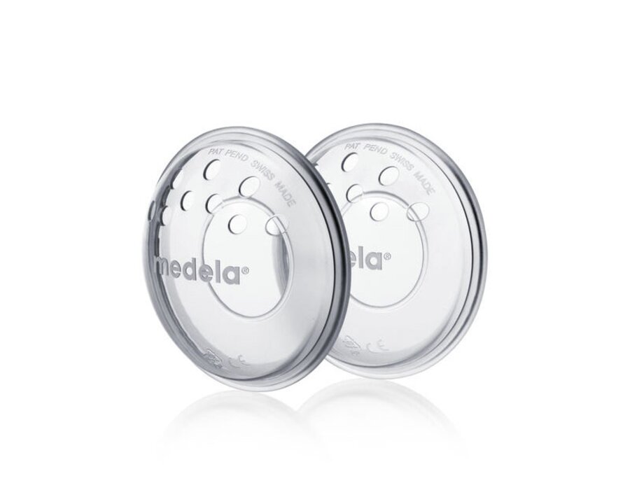 Angled view of a pair of Medela Breast shells.