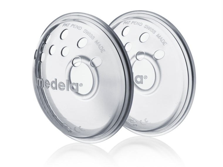 A pair of Medela Nipple formers, side view.