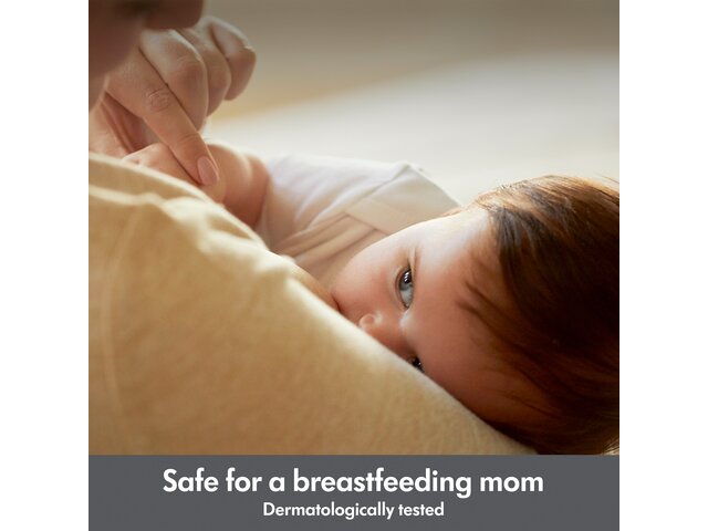 Medela Hydrogel Pads are dermatologically tested and safe for a breastfeeding mom.  Mom holding baby while nursing.