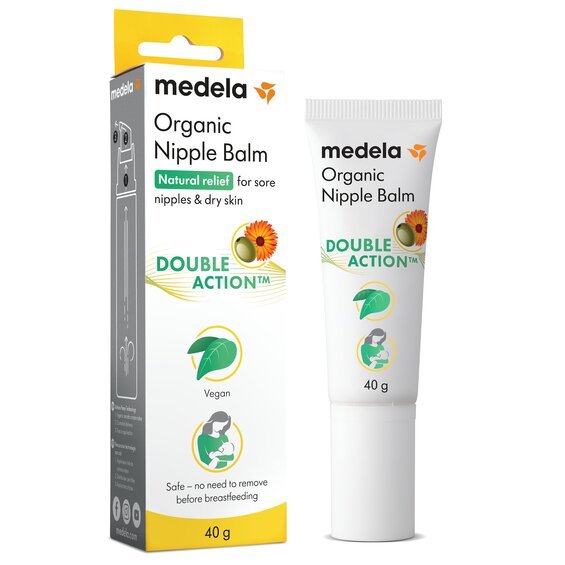 Eine 40g-Tube Bio-Säuglingscreme von Medela neben der Verkaufsverpackung.