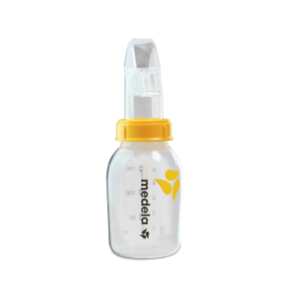 An advanced cup feeder, the Medela SoftCup™. It is connected to a reusable Medela breast milk storage bottle.