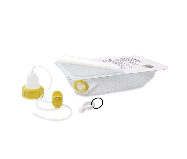 Open Medela Starter SNS™ with parts inside and outside the 80 ml basin.