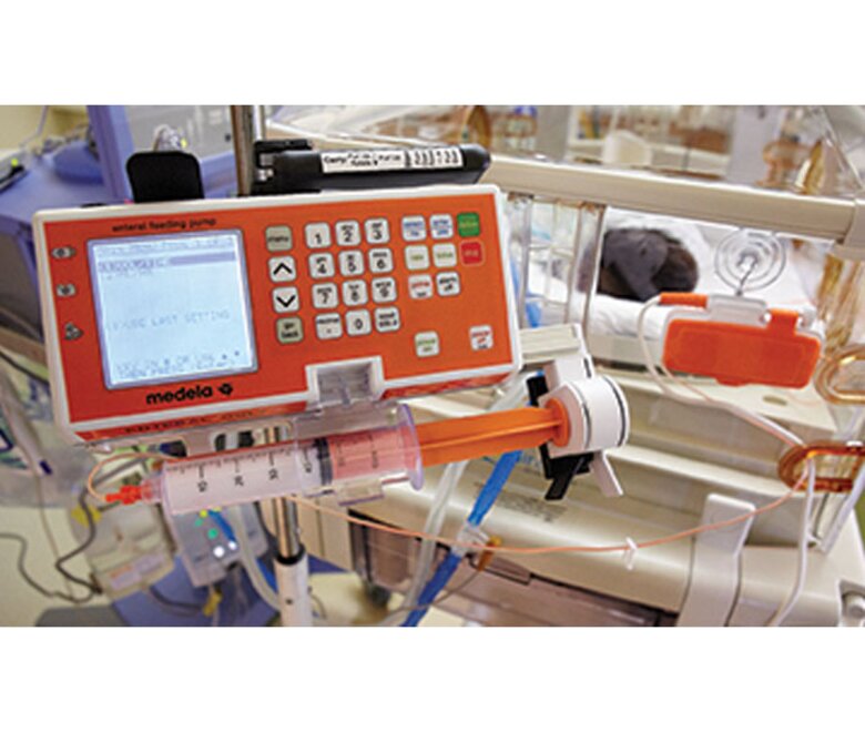 A Medela Enteral Feeding Pump in use on the neonatal ward of a hospital.