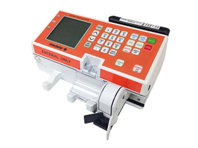 Medela Enteral Feeding Pump The Medela Enteral Feeding Pump with a large keypad and large graphic LCD display.