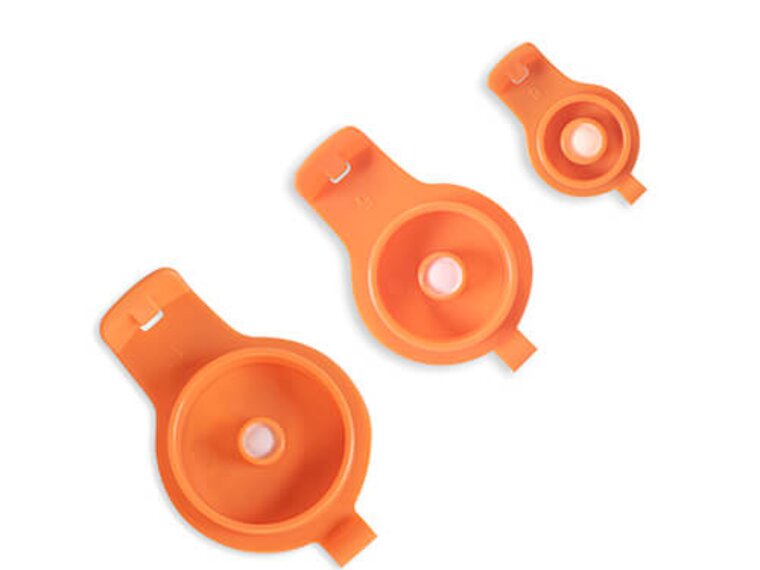 Three different sizes of Medela TwistLok® GraviFeed® Syringe Lids, 10 mL, 30mL and 60mL.