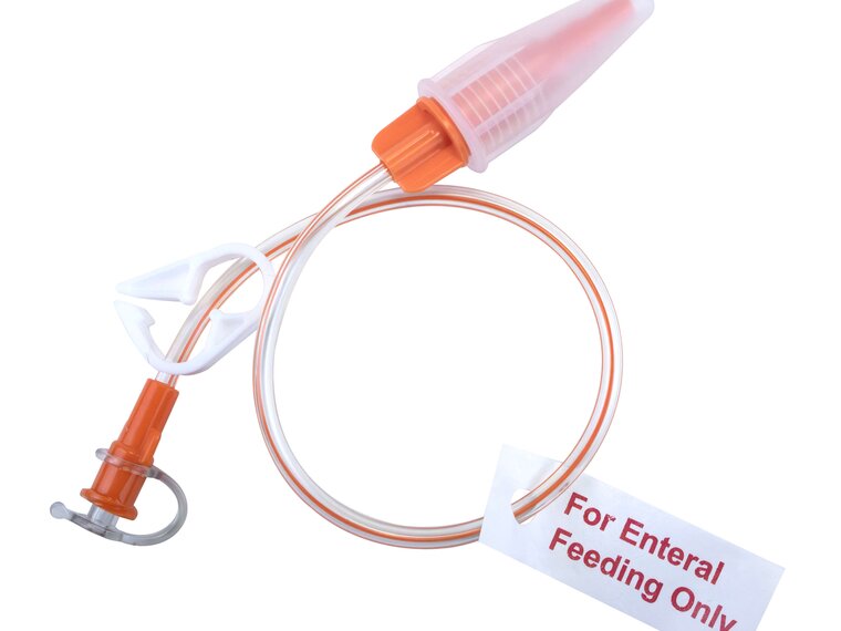 TwistLok G-tube Extension Set Full image of TwistLok G-tube Extension Set with tag that reads For Enteral Feeding Only.