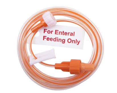 Full shot of ENFit extension set without medication port.