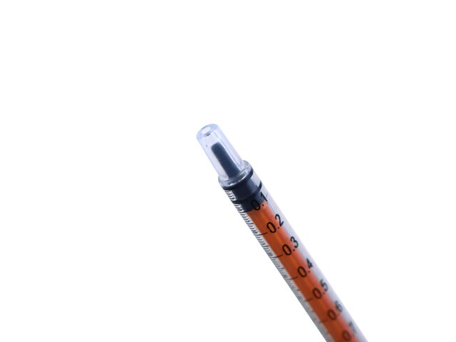 Close up of tip of Medela Oral Syringe with plunger pushed down.