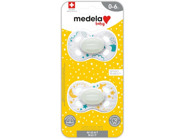 Retail packaging for Medela NIGHT & NIGHT dummy 0-6 months, with SensoPearls™ in the hedgehog and moon & stars designs.