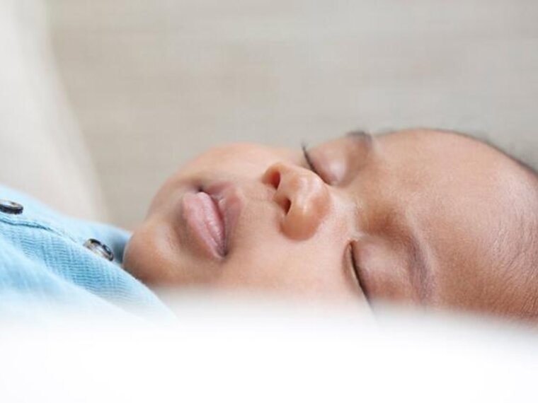 Close-up of a sleeping baby boy.
