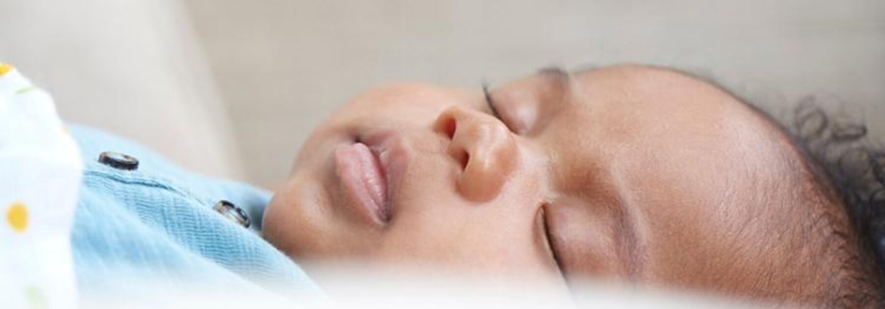 Close-up of a sleeping baby boy.