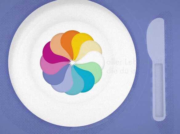 Ein Tischset für Kleinkinder mit Gabel, Messer und Teller.