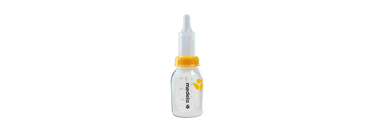 A reusable Medela SpecialNeeds™ Feeder nipple attached to a Medela breast milk storage bottle.
