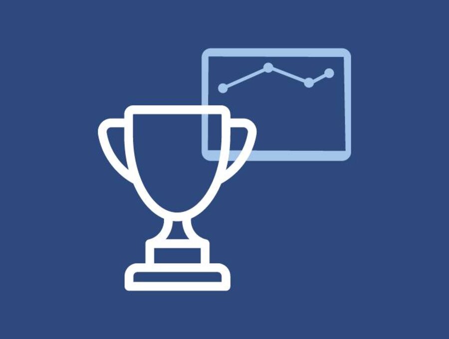 Icon-like image of trophy with a line chart behind it.
