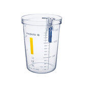 Un tarro de succión del sistema de extracción desechable (DCS) de Medela con un código de color amarillo para 1500 cc.