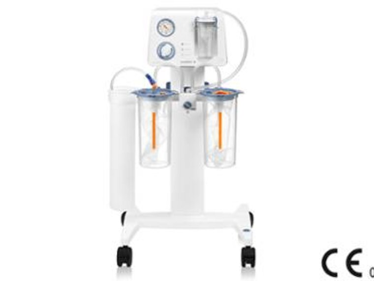 The mobile Medela Dominant Flex surgical suction pump on standard rail with 2500cc disposable jars with liners.