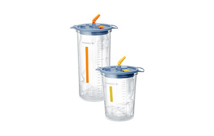 El tarro de succión Medela Disposable Collection System (DCS), amarillo para 1500cc y naranja para 2500cc, para usar con extractores quirúrgicos.