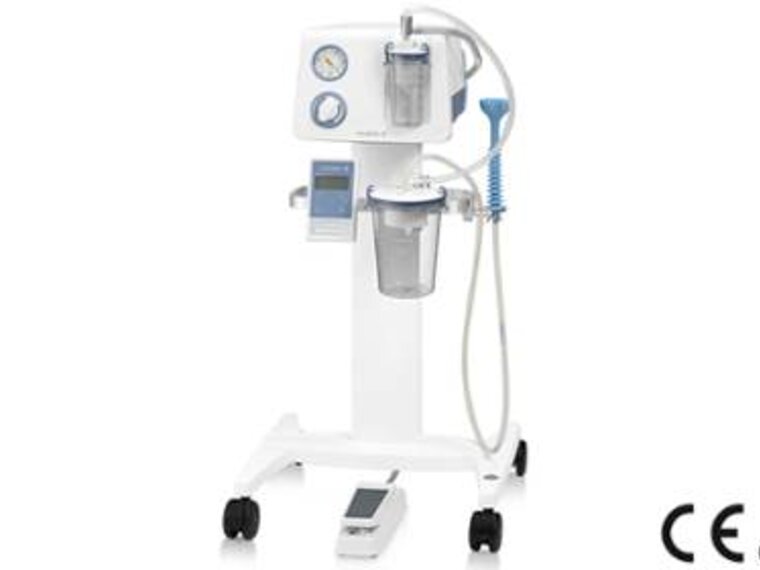 A Medela Vacuum Assisted Delivery System equipped with an Apgar timer and a foot control for hands-free suction.