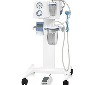 A Medela Vacuum Assisted Delivery System equipped with an Apgar timer, a foot control for hands-free suction and other accessories.