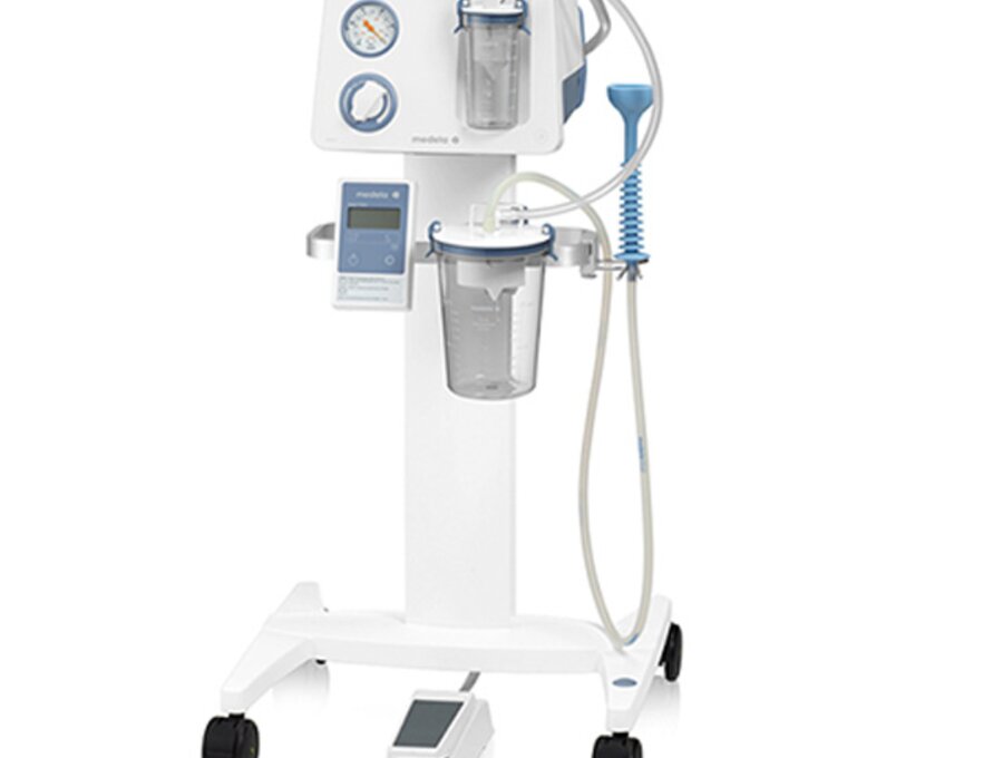 A Medela Vacuum Assisted Delivery System equipped with an Apgar timer, a foot control for hands-free suction and other accessories.