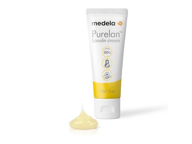 Tube of Medela Purelan™ lanolin cream 37 g with a droplet of cream next to it