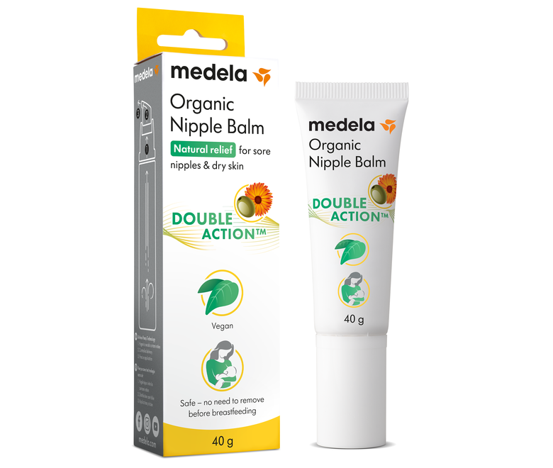Eine 40g-Tube Bio-Säuglingscreme von Medela neben der Verkaufsverpackung.
