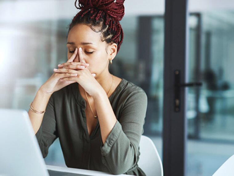 woman sitting in front of latop