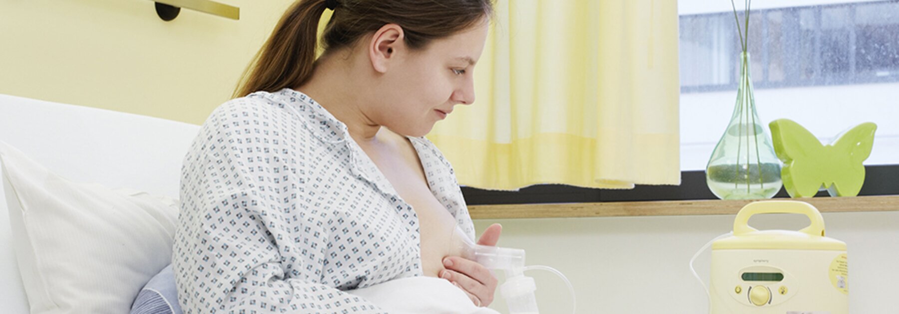 Lactation Professionals A mom uses the Medela Symphony® breast pump to manage her physiological breast engorgement.